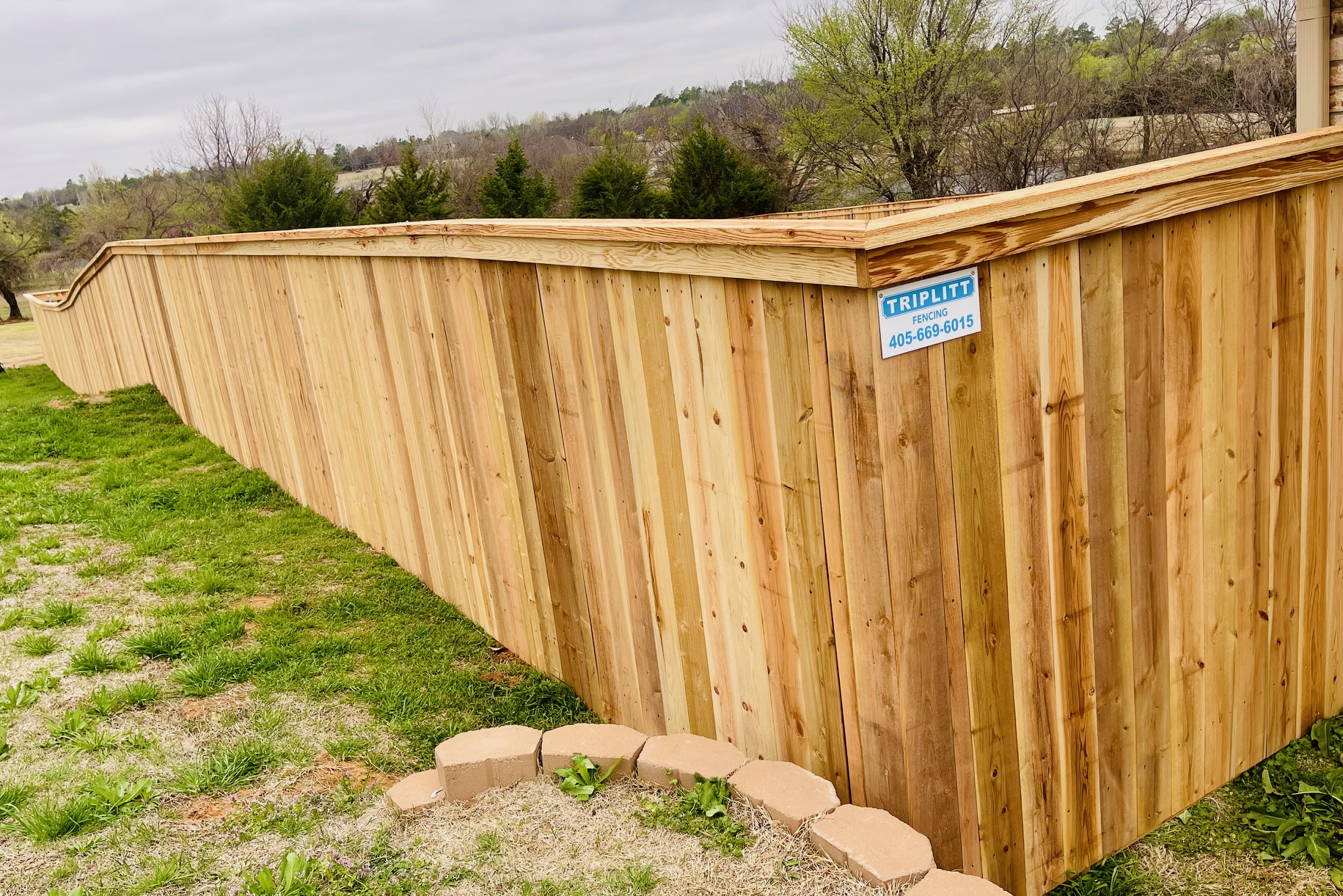 Gorgeous, strong, perfect Cedar fence complete with cap/trim completed in Tuttle, OK