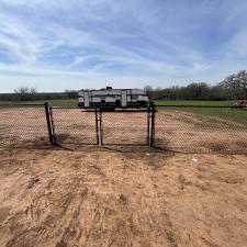 Large-Black-Chain-Link-Fence-installation-on-a-beautiful-country-property-in-Lindsay 1