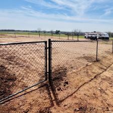 Large-Black-Chain-Link-Fence-installation-on-a-beautiful-country-property-in-Lindsay 0