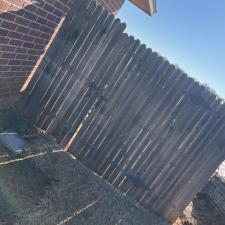 Perfectly-Crafted-customized-fence-installation-in-Midwest-City-Complete-with-a-personalized-dog-window-and-stainseal 5