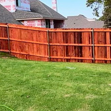 Redwood-Stain-job-on-a-brand-new-Cedar-fence 2