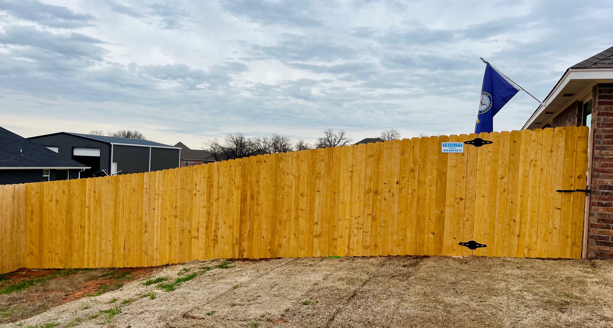 Strong Pre-stained Douglas Fir wood fence installation finished for a wonderful military family in Blanchard, OK