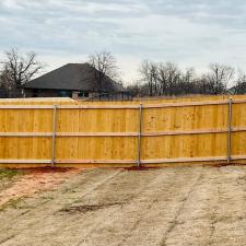 Strong-Pre-stained-Douglas-Fir-wood-fence-installation-finished-for-a-wonderful-military-family-in-Blanchard-OK 0