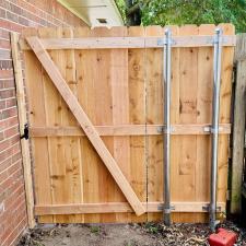 The-perfect-Cedar-fence-complete-with-a-very-elegant-black-powder-coated-chainlink-fence-installed-in-Del-City 0