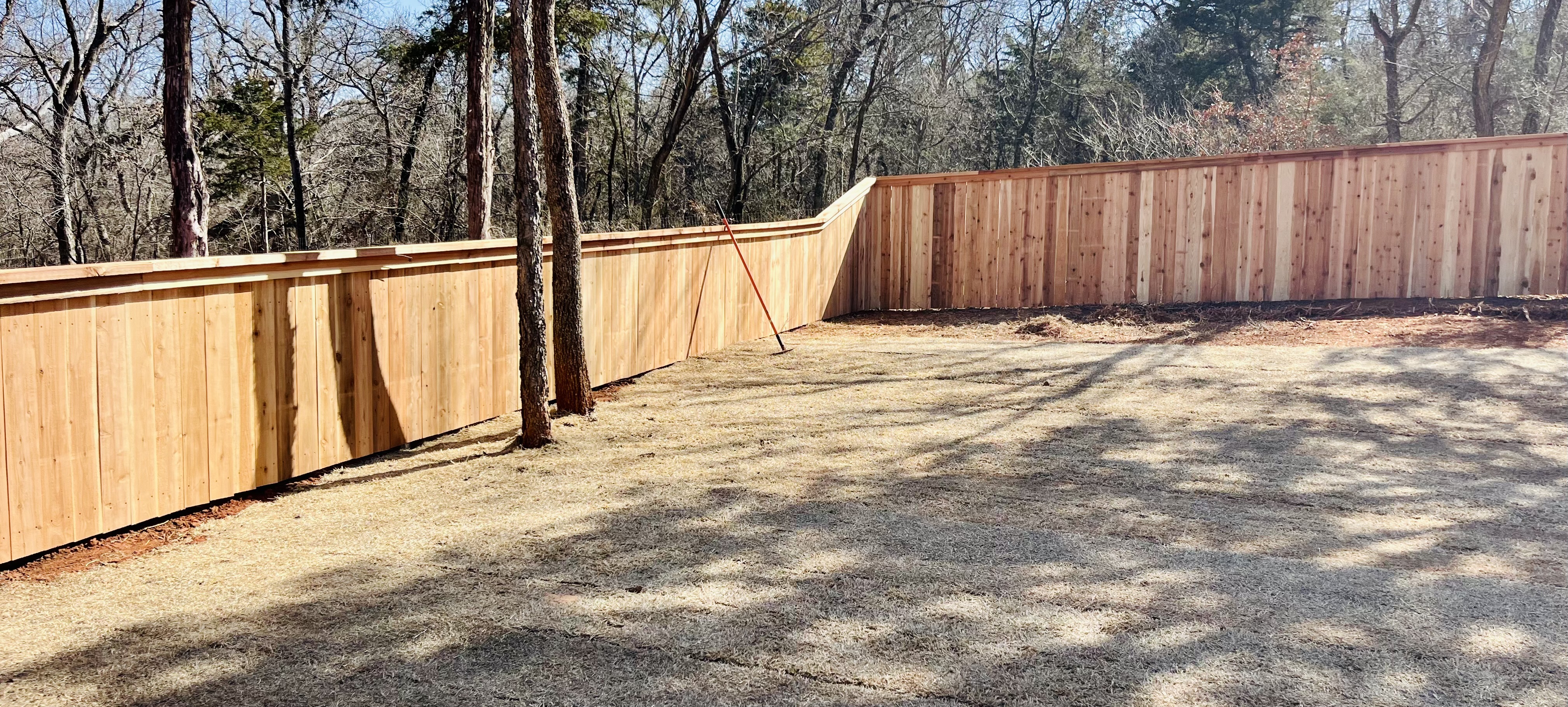 Top quality, gorgeous cedar fence, complete with cap and trim completed in Guthrie, OK